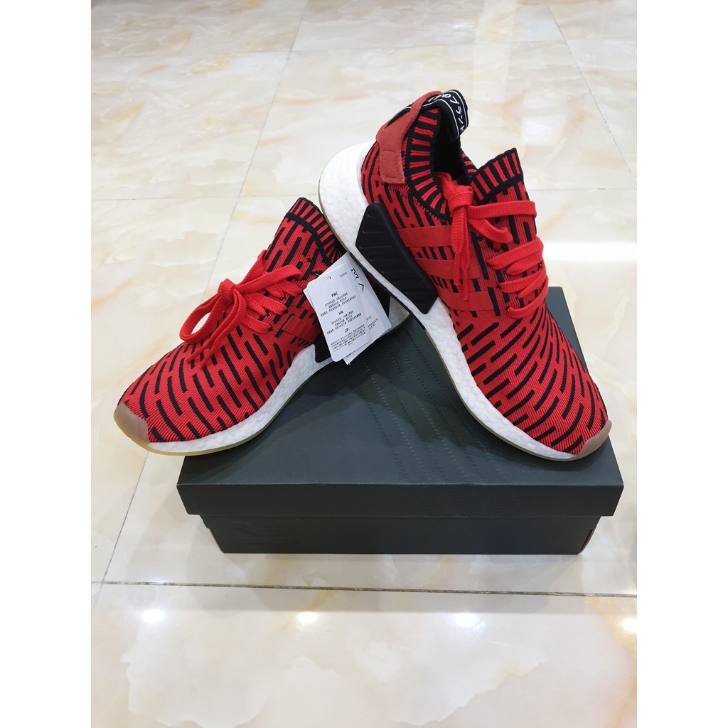 Nmd r2 hotsell black red giá